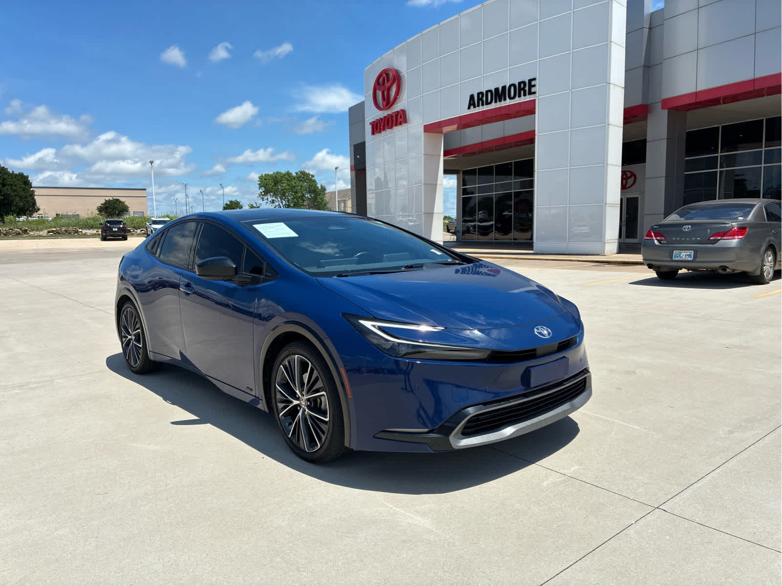 2024 Toyota Prius XLE in Reservoir Blue — front three-quarter view