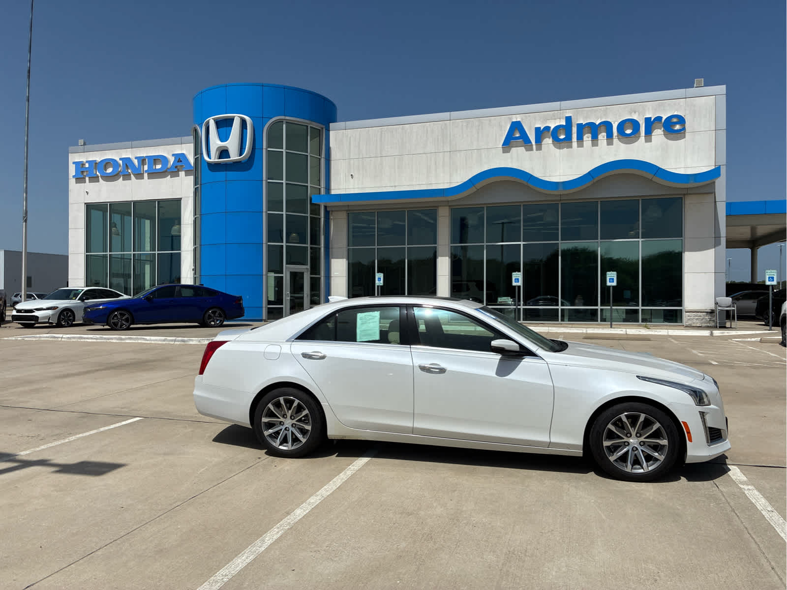 2016 Cadillac CTS Sedan Luxury Collection RWD in Crystal White Tricoat — front three-quarter view