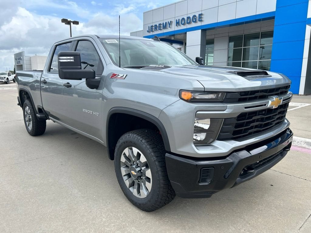 2026 Chevrolet Silverado 2500 HD Custom in Sterling Gray Metallic — front three-quarter view