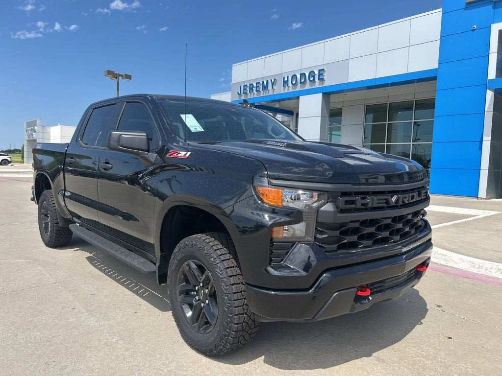 2026 Chevrolet Silverado 1500 Custom Trail Boss in Black — front three-quarter view